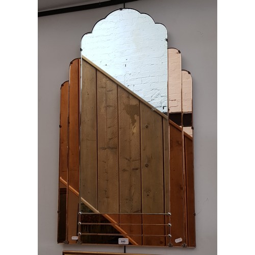 840 - A 1930s Art Deco wall mirror with peach glass panels, 53.5cm x 92cm.