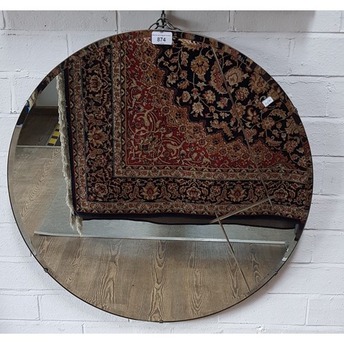 874 - A 1930s Art Deco etched glass wall mirror, diameter 66cm.