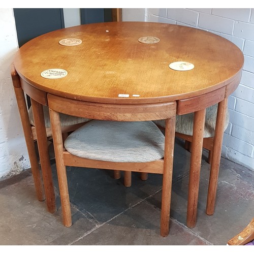 883 - Hans Olsen for ABJ, Danish teak dining table with four three legged chairs, marked 'made in Denmark ... 