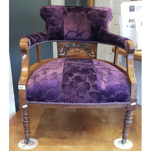 882 - An Edwardian inlaid rosewood tub chair and an onyx standard lamp.