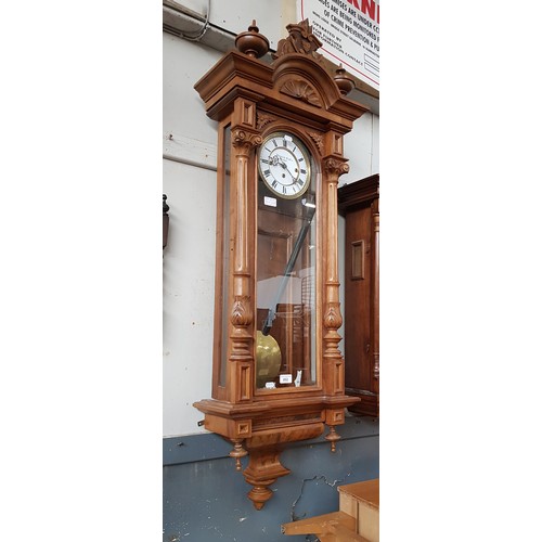 892 - A walnut cased triple weight Vienna wall clock.