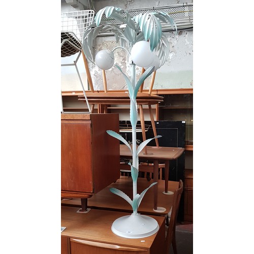 908 - A metal floor standing lamp modelled as a palm tree.