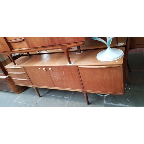 907 - A mid 20th century McIntosh teak sideboard, length 7'.