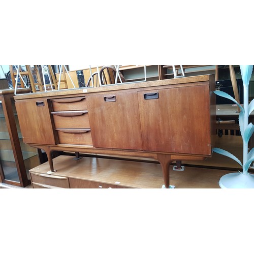 906 - A mid 20th century teak sideboard by Greaves & Thomas, length 176cm.