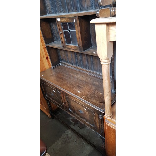 927 - A 1920s oak dresser.