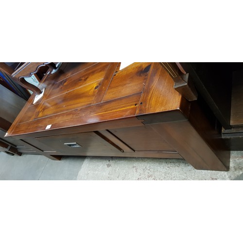 939 - A mahogany coffee table, length 130cm.