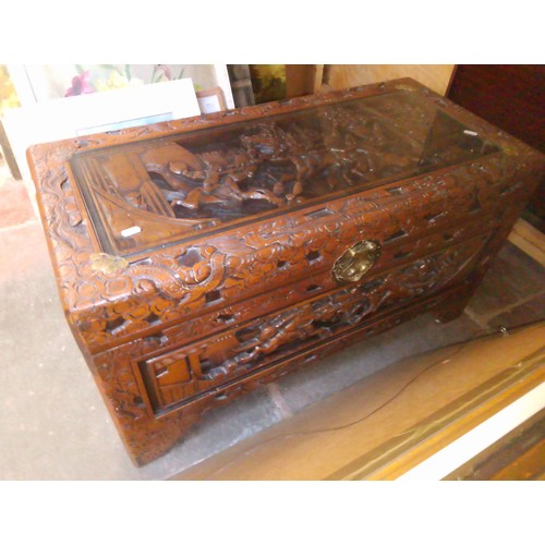 1016 - A carved eastern chest.