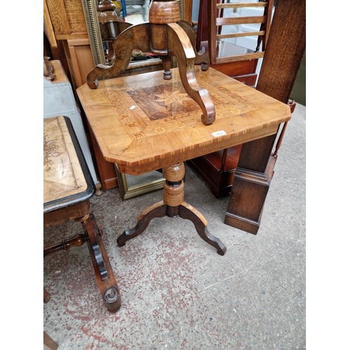 1025 - A Victorian parquetry inlaid walnut pedestal table.