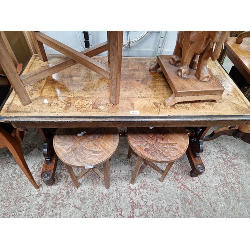 1023 - A Victorian inlaid walnut side table.