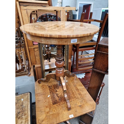 1024 - A Victorian parquetry inlaid walnut pedestal table with chess board top.