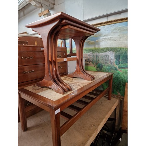 1034 - A mid 20th century G Plan teak nest of tables together with a teak and tile top coffee table.