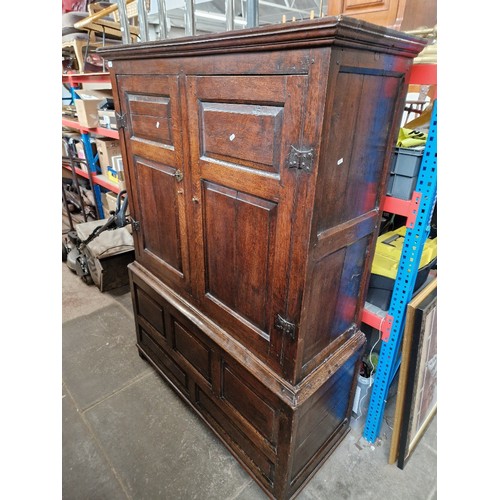 1030 - An 18th century oak housekeeper's cupboard.