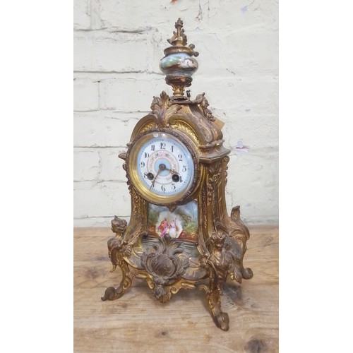 93 - A French late 19th century ormolu and porcelain mantle clock.