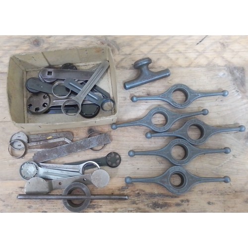 A group of five Rolex Oyster case back openers, two other Rolex type ...