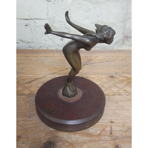 132 - A bronze car mascot modelled as a nude lady, mounted on wooden base, height 19.5cm.