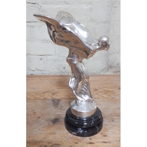 131 - An Art Deco chrome figure modelled as A Rolls Royce 'Flying Lady' car mascot, height 33cm.