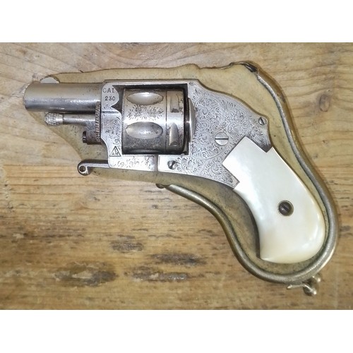 149 - A Belgian .230 calibre centre fire pocket revolver, engraved side plates and mother of pear handle, ... 