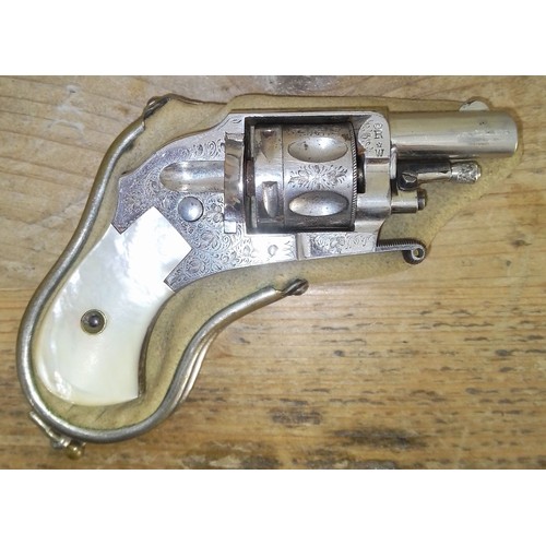 149 - A Belgian .230 calibre centre fire pocket revolver, engraved side plates and mother of pear handle, ... 