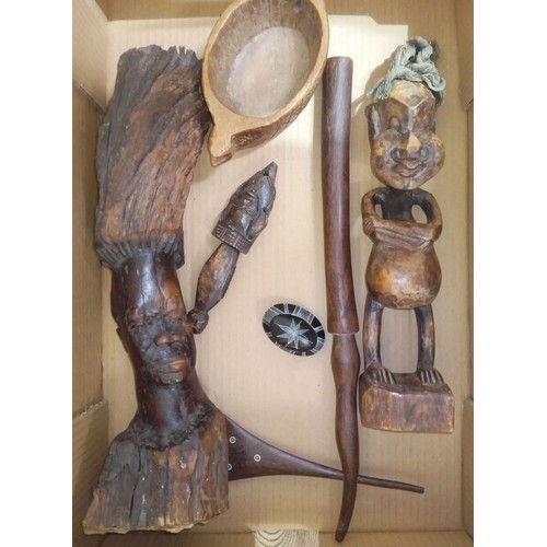 145 - A box of assorted African items including two figures one from a root carving, an axe, an African tr... 