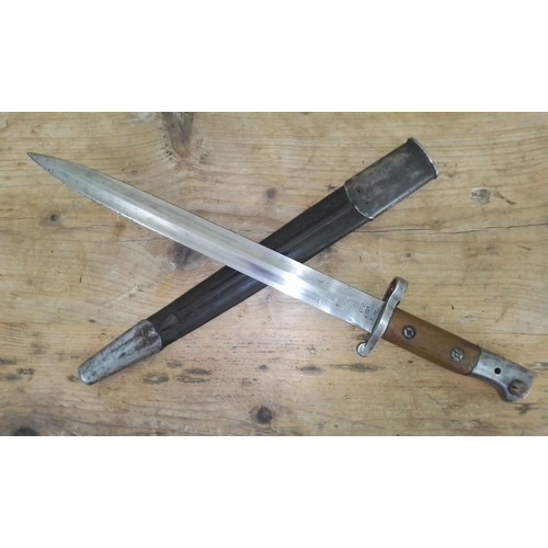 156 - A British 1903 pattern bayonet by Mole, leather scabbard.