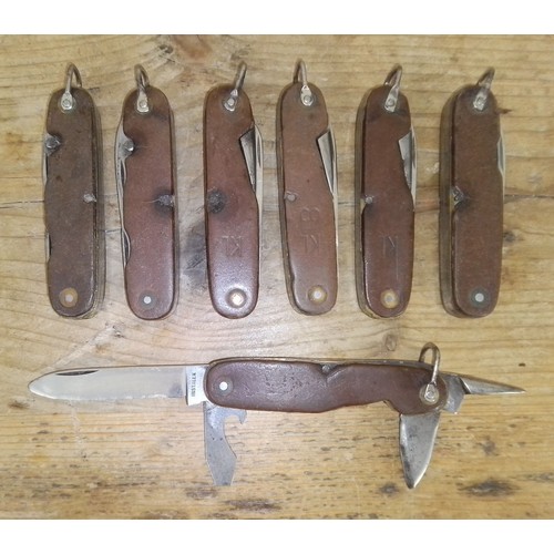 163 - A group of seven Dutch army pen knives by Amefa and Instalex.