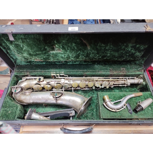 203 - An American tenor saxophone marked 'Martin, Elkhart Ind', 'LOW PITCH', serial no.108530, with hard c... 