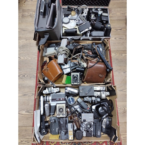 220 - Two boxes and a hard case of cameras binoculars and accessories including Nikon & Canon 35mm cameras... 