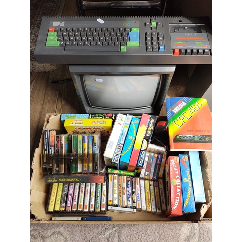 229 - Amstrad CPC 464 computer together with Amstrad CTM 644 colour monitor and a box of various games, jo... 