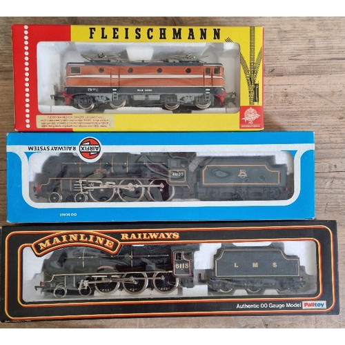 335 - Three boxed 00 gauge locomotives comprising of a Fleischmann 4365, Airfix Royal Scot B.R. Livery 541... 