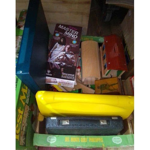 445 - A box of assorted vintage toys including Test Match, Mastermind, a Brio train set etc.