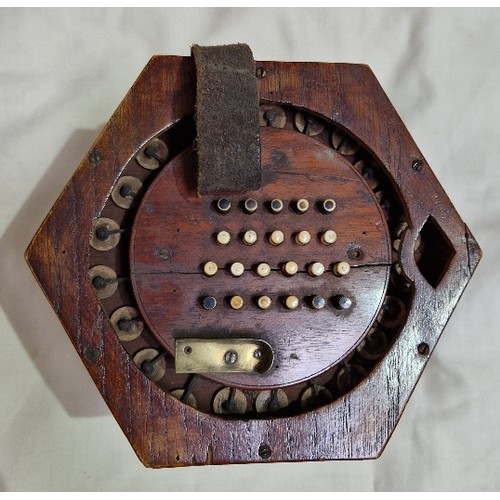 208 - A Victorian concertina squeeze box, the mahogany case marked 'G F Wilson, London', together with a C... 