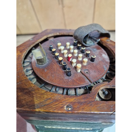 208 - A Victorian concertina squeeze box, the mahogany case marked 'G F Wilson, London', together with a C... 