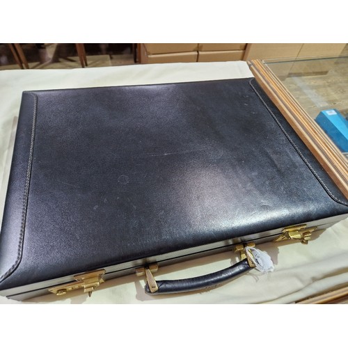 237 - A black leather Hilton Collection executive case by Papworth Industries (Swaine Adeney Brigg), with ... 