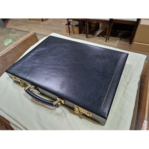 237 - A black leather Hilton Collection executive case by Papworth Industries (Swaine Adeney Brigg), with ... 