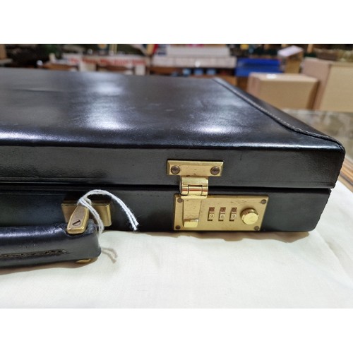 237 - A black leather Hilton Collection executive case by Papworth Industries (Swaine Adeney Brigg), with ... 