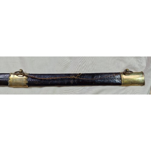 152 - A Naval type sabre with wired shagreen handle, brass guard and cast lion pommel, blade length 74.5cm... 