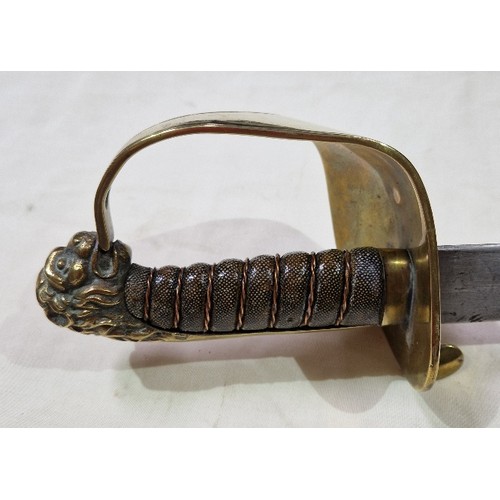 152 - A Naval type sabre with wired shagreen handle, brass guard and cast lion pommel, blade length 74.5cm... 