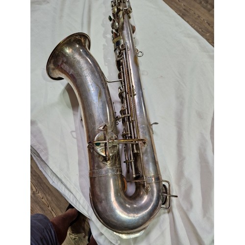 203 - An American tenor saxophone marked 'Martin, Elkhart Ind', 'LOW PITCH', serial no.108530, with hard c... 