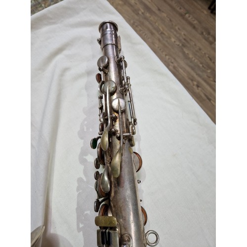 203 - An American tenor saxophone marked 'Martin, Elkhart Ind', 'LOW PITCH', serial no.108530, with hard c... 