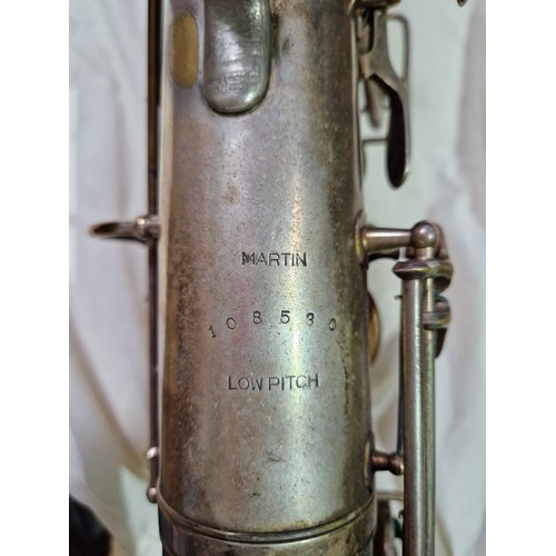 203 - An American tenor saxophone marked 'Martin, Elkhart Ind', 'LOW PITCH', serial no.108530, with hard c... 