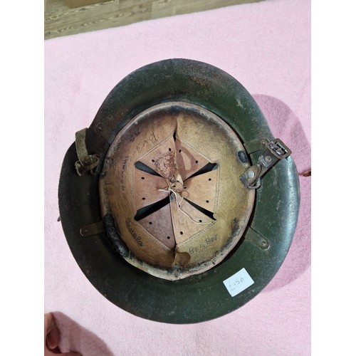 175 - A WWII Bulgarian helmet and three others.