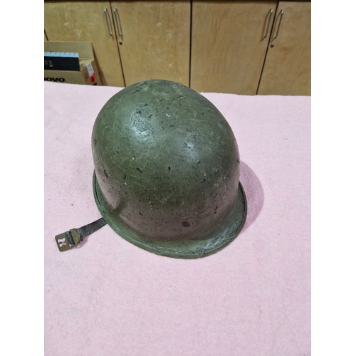 175 - A WWII Bulgarian helmet and three others.