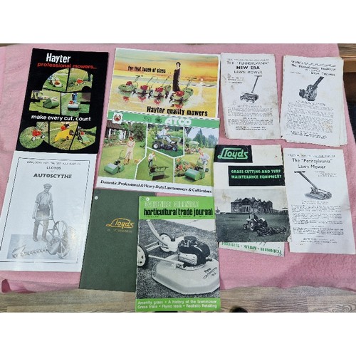 384 - Two boxes of assorted ephemera including motoring, garden machinery, also including a Fighters poste... 