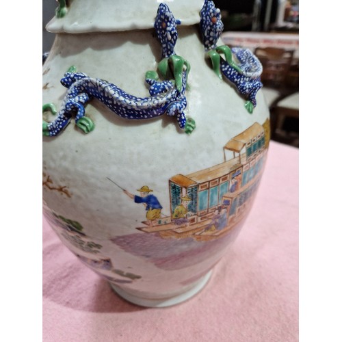 123 - A Chinese porcelain vase, mid 19th century, decorated in over enamels with boats and figures, applie... 