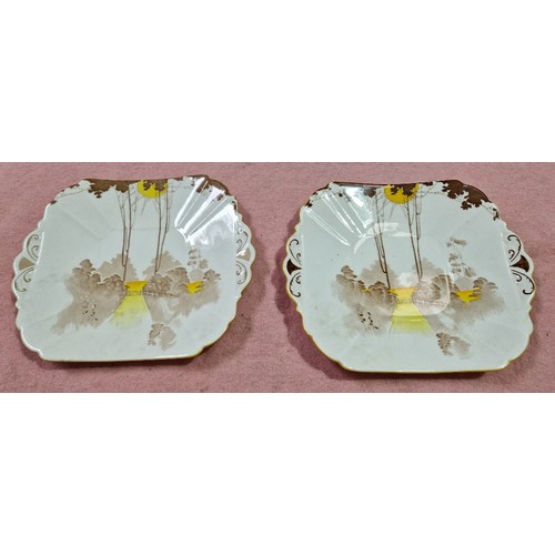 495 - A Shelley Sunrise and Tall Trees Art Deco tea service, 40 pieces.