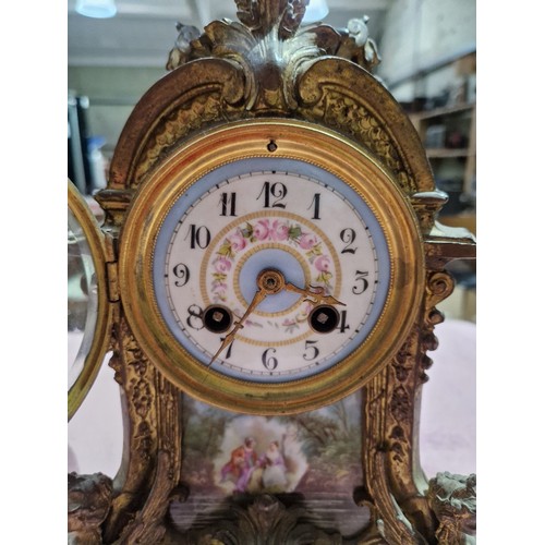 93 - A French late 19th century ormolu and porcelain mantle clock.