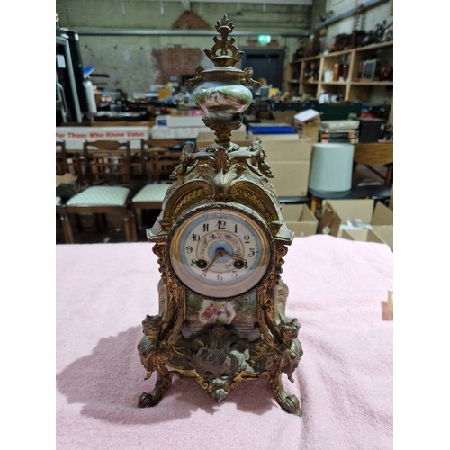 93 - A French late 19th century ormolu and porcelain mantle clock.