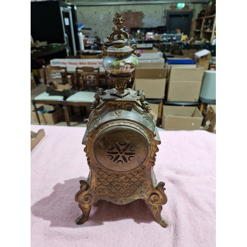 93 - A French late 19th century ormolu and porcelain mantle clock.