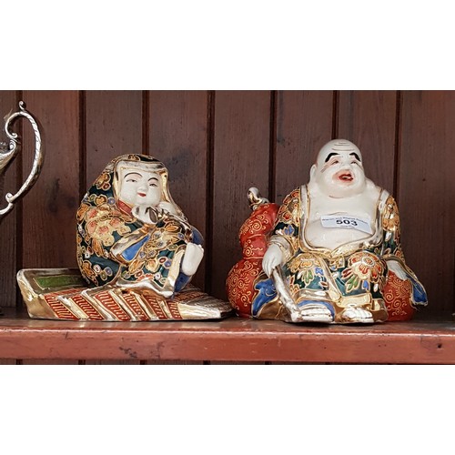 503 - A pair of Japanese Satsuma seated figures. - one with chipped base