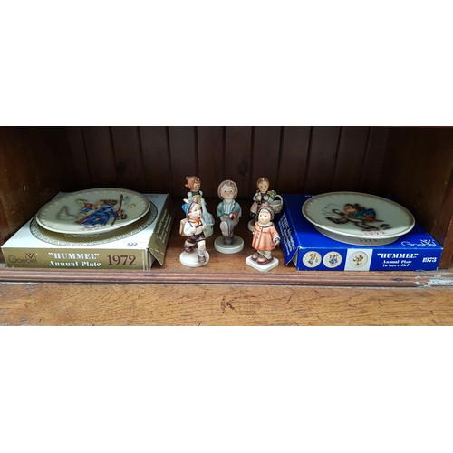 522 - 5 Hummel figurines including ‘School Boy’ (1950-55) and 2 boxed Hummel Annual plates for 1972 & 1973